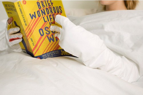 Blanket with built in gloves for reading in bed